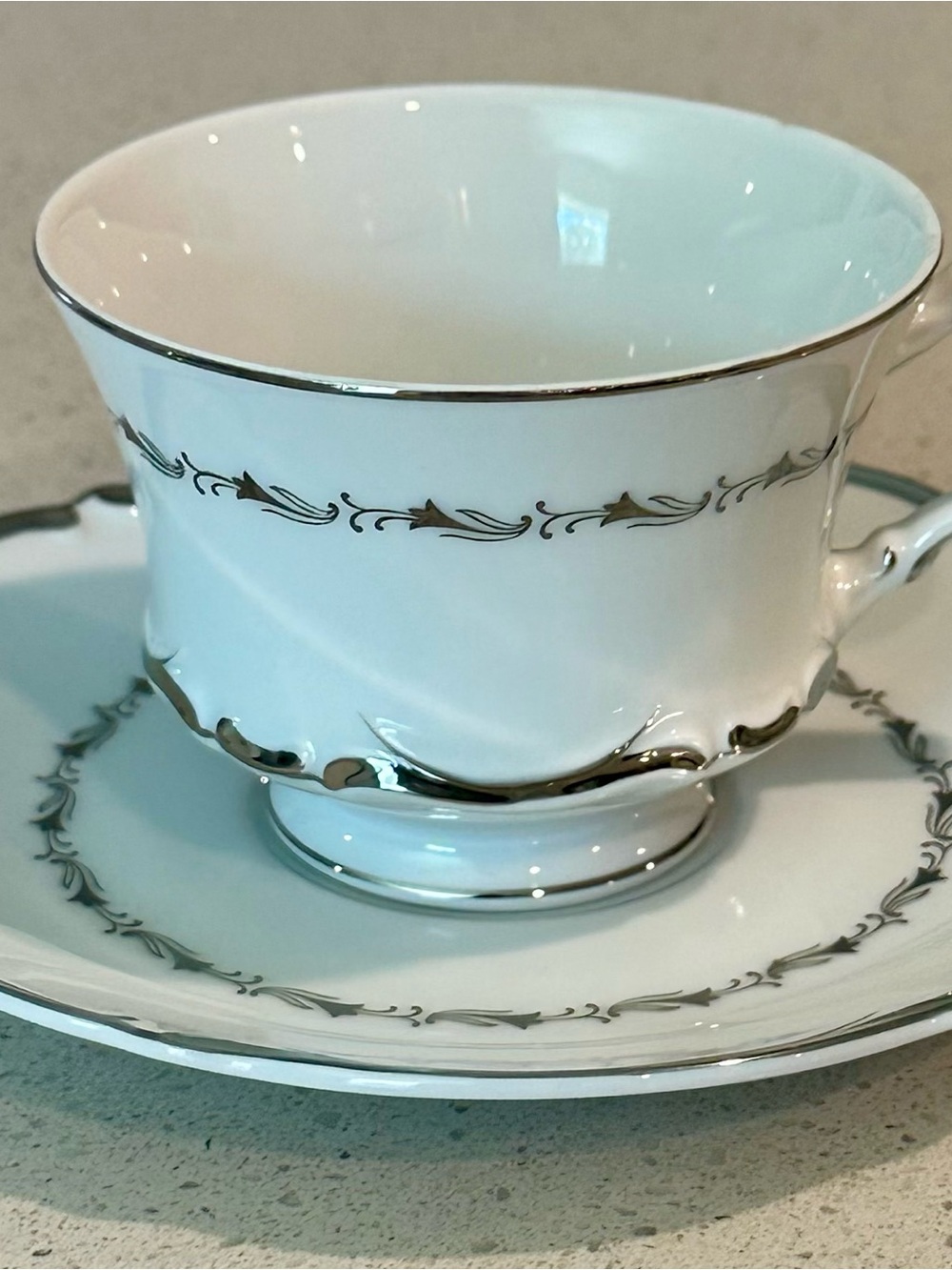 Porcelain Teacup & Saucer with Silver Trim - White